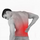 Hoe wordt pijn aan de rug veroorzaakt en hoe te behandelen?